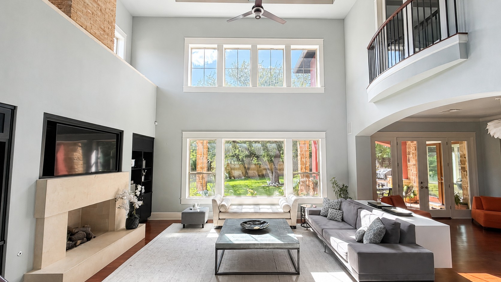 Natural light floods the first floor living room and brings the outdoors in.
